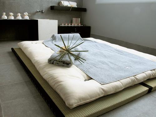 
Кровать или кровати в номере Hotel Mioni Pezzato
