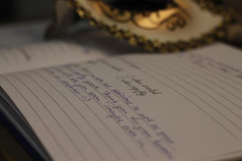 a close up of a book with writing on it at Un sogno B&B in Marghera