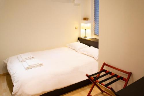 Кровать или кровати в номере Athens Best location, 6 Ermou street, Syntagma square