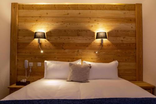 Ένα ή περισσότερα κρεβάτια σε δωμάτιο στο Hotel SNOW CHILL