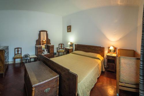A bed or beds in a room at Casa com Quinta Tradicional