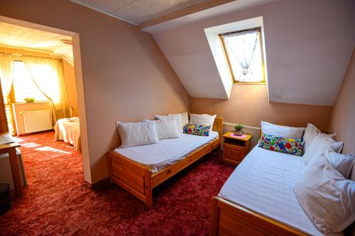 Кровать или кровати в номере Hotel Chichin