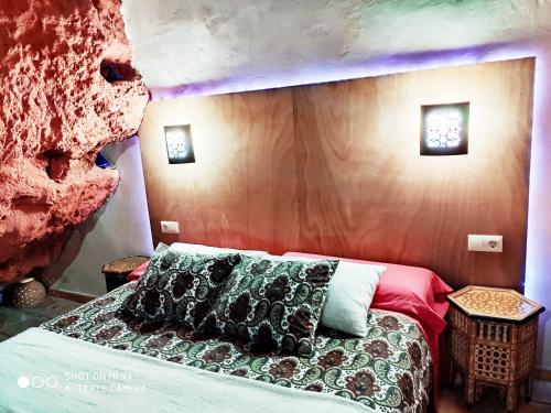 Llit o llits en una habitació de Al-Axara Home Spa