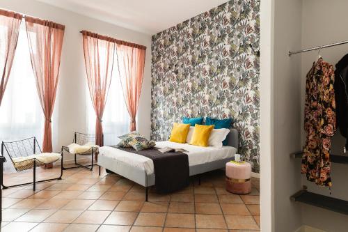 Posteľ alebo postele v izbe v ubytovaní Gianicolo Jungle Apartment - Onofrio