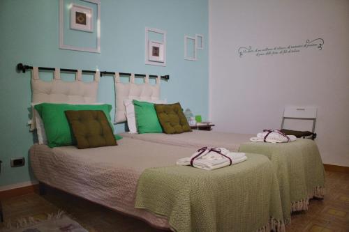 Cama ou camas em um quarto em La Collina dei Ciliegi