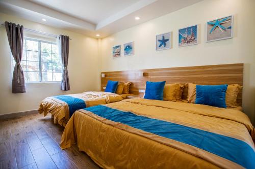 Un pat sau paturi într-o cameră la Residence Lodge