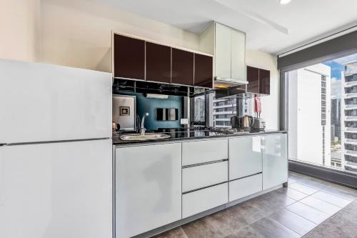 Kuchyň nebo kuchyňský kout v ubytování Pegasus Apart-Hotel