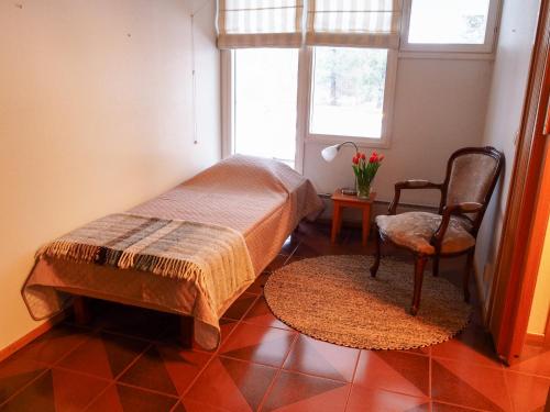 Ένα ή περισσότερα κρεβάτια σε δωμάτιο στο Koski-Ketola