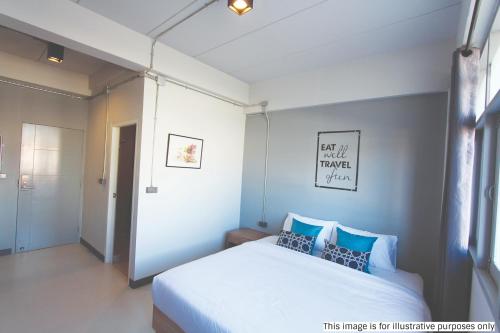 Posteľ alebo postele v izbe v ubytovaní Rajthani Hotel - SHA Certified