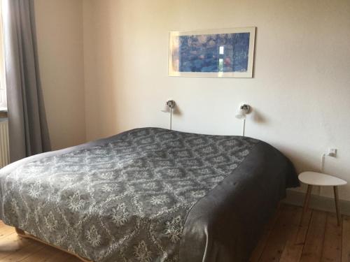Ein Bett oder Betten in einem Zimmer der Unterkunft Ørstedsgade, Sønderborg