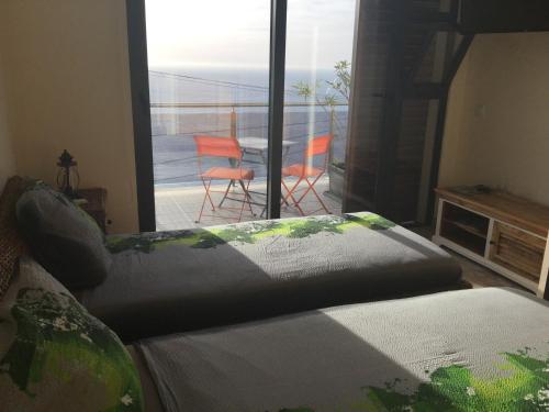 Ένα ή περισσότερα κρεβάτια σε δωμάτιο στο Guesthouse-TheView