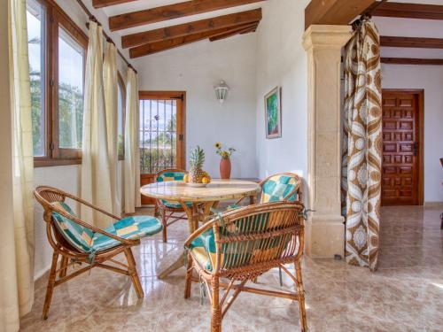 a dining room with a table and chairs at Holiday Home La Concha by Interhome in Balcon del Mar
