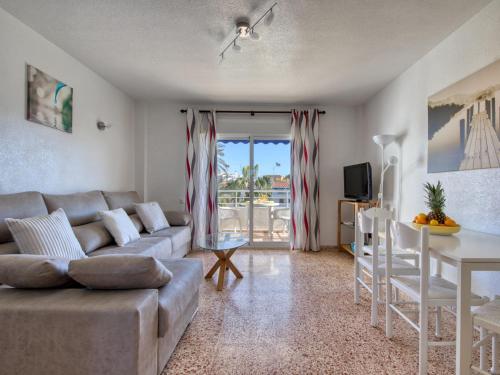 a living room with a couch and a table at Apartment Don Pepe-5 by Interhome in Balcon del Mar