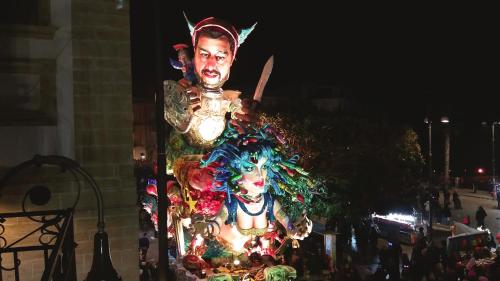 a large statue of a man in a costume at a parade at BnB Agorà Panoramic Rooms in Sciacca