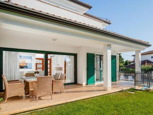 Balkón nebo terasa v ubytování Holiday Home Villa Beach Front by Interhome