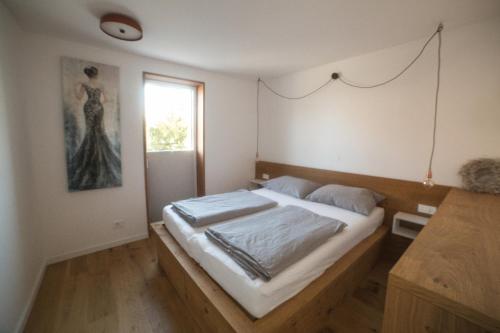 Postel nebo postele na pokoji v ubytování Klajder