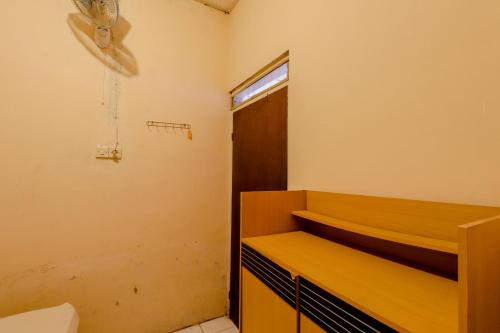 a room with a bunk bed and a basketball hoop at Omah Nggunung Cafe & Homestay in Yogyakarta