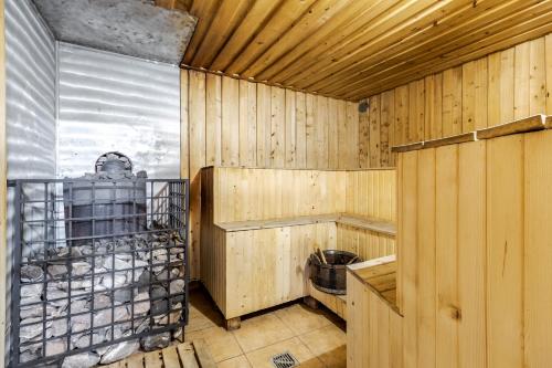 a room with wooden walls and atainedasteryasteryasteryasteryasteryasteryasteryastery at Маріна Драгобрат in Dragobrat