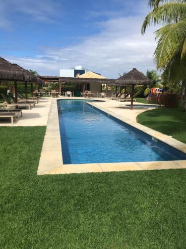 Bazén v ubytování Apartamento no Condomínio Iberostate Praia do Forte nebo v jeho okolí