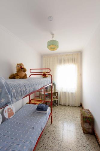 Postel nebo postele na pokoji v ubytování Apartaments La Pertusa 2o