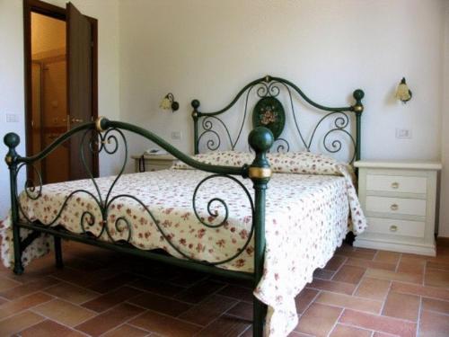 Giường trong phòng chung tại Agriturismo Raggioverde