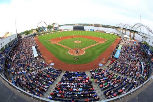 a large crowd of people watching a baseball game at Holiday Inn Express Moline - Quad Cities Area by IHG in Moline