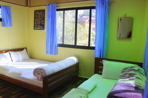 Horizon Homestayにあるベッド