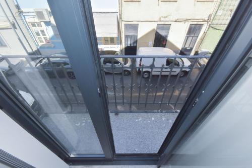 a view from the window of a balcony at Near The Beach Apartments in Matosinhos