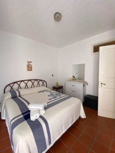 Säng eller sängar i ett rum på Casa Vacanze Marco Polo vista mare