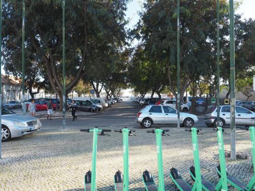 a parking lot with a lot of parked cars at The Portuguese Element in Faro