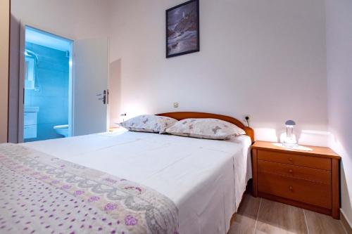 Katil atau katil-katil dalam bilik di Apartments Bajcic