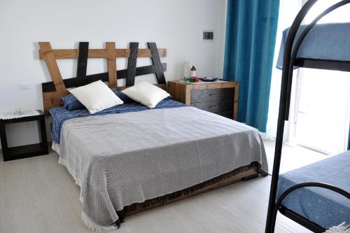 Postel nebo postele na pokoji v ubytování Sant Isidoro suite