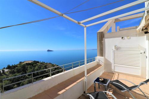 a balcony with a view of the ocean at Villa Marina in Benidorm