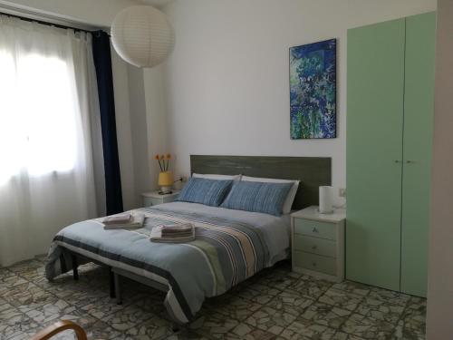 Säng eller sängar i ett rum på Domo Sul Porto