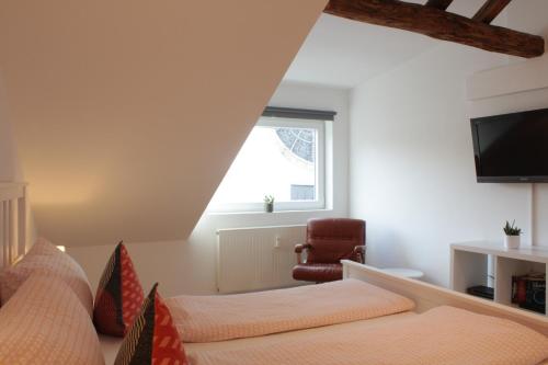 Posteľ alebo postele v izbe v ubytovaní Über den Dächern Boppards