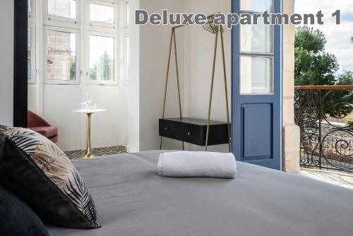Valletta Hastings Suitesにあるベッド