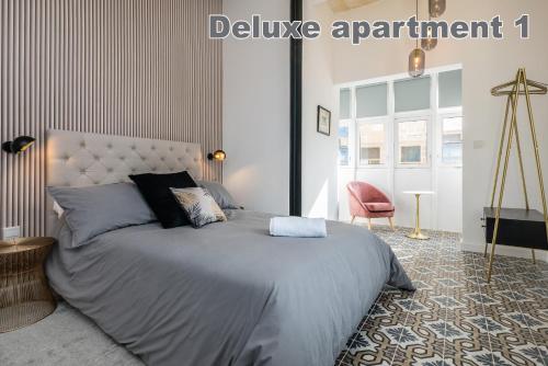Valletta Hastings Suitesにあるベッド