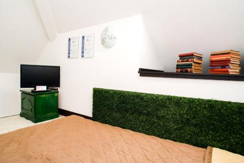 Televisyen dan/atau pusat hiburan di St. Gellért Square - Minilux Apartman