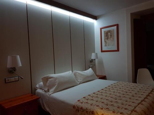 Katil atau katil-katil dalam bilik di Hostal El Panadero