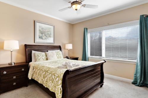 a bedroom with a bed and a window at Venus Lodges Condos in Gatlinburg