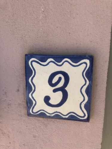a sign on a wall with a number three at Loft 3 - 1 of 5 downtown in Alpine