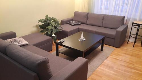 Khu vực ghế ngồi tại Apartment on Prospekt Masherova 26