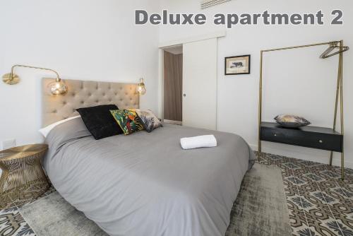Valletta Hastings Suitesにあるベッド