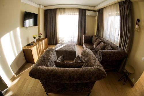 Posezení v ubytování Expecto Apartments