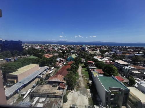 an aerial view of a city with buildings at Avida Davao by davaobnb & Lemonique Homes in Davao City