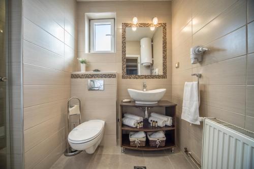 Koupelna v ubytování Garni Hotel President de Luxe