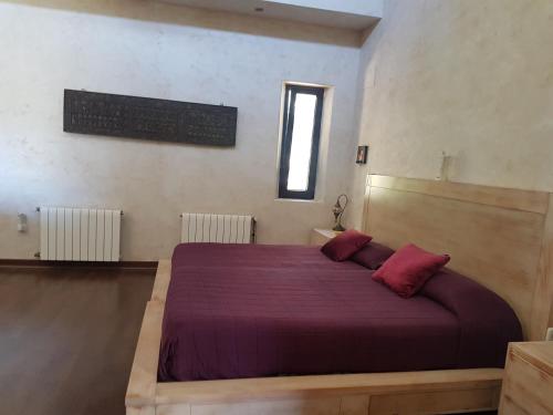 En eller flere senge i et værelse på Villa chillout la barrosa