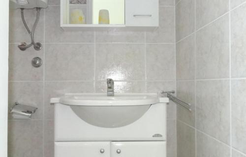 a bathroom with a sink and a toilet at STUDIO MIMI CENTER OF TOWN KRK CROATIA in Krk