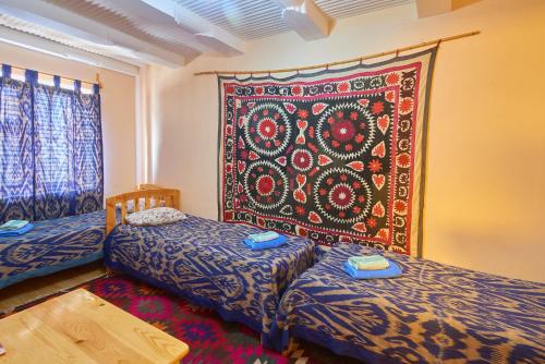 A bed or beds in a room at B&B Emir