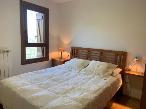 Postel nebo postele na pokoji v ubytování C17 - Edif Aigualluts - Villmor